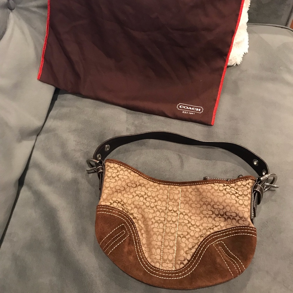 Coach shoulder bag with storage bag
